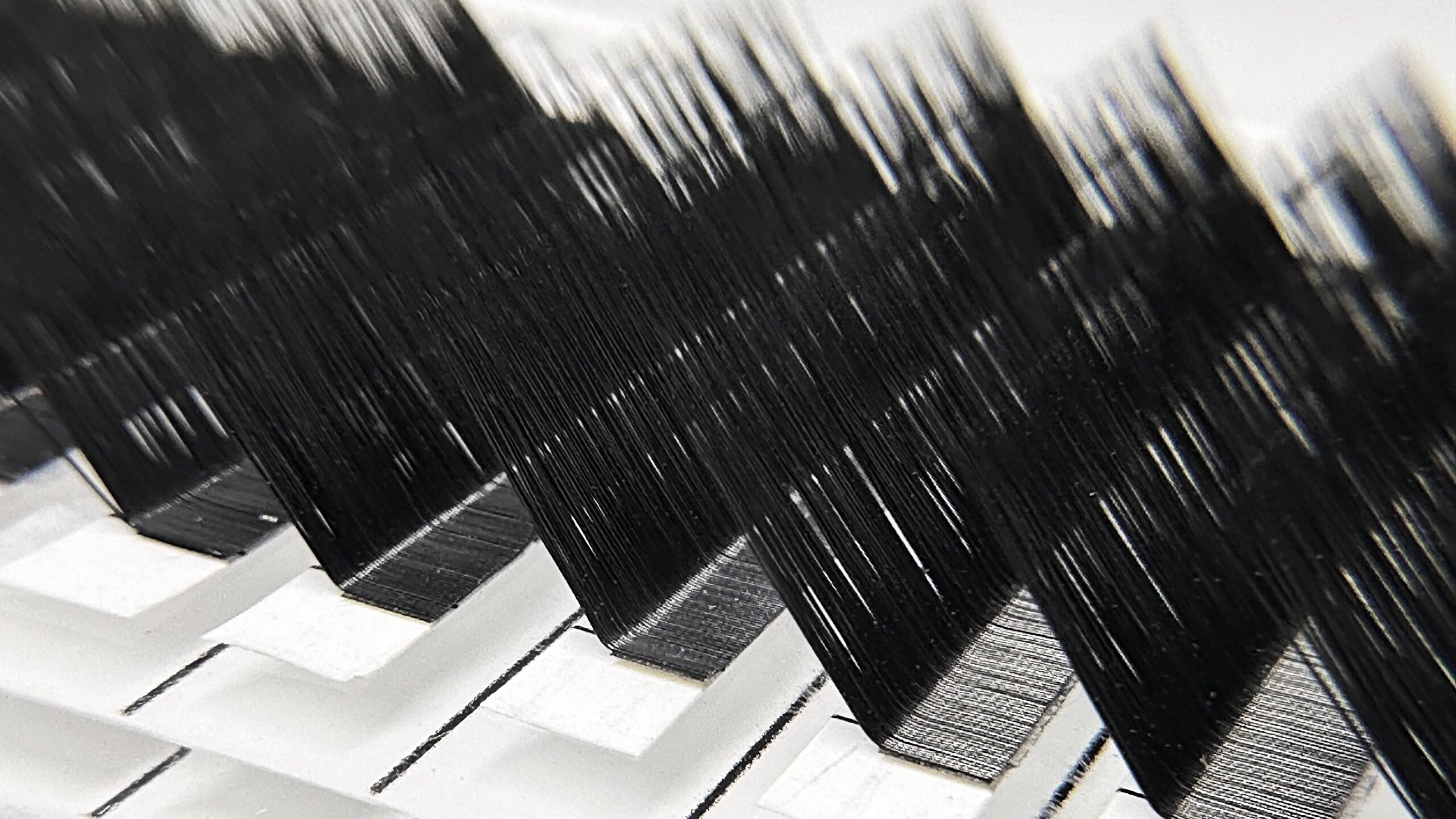 L curl lash extensions offering a subtle and graceful look for everyday beauty.